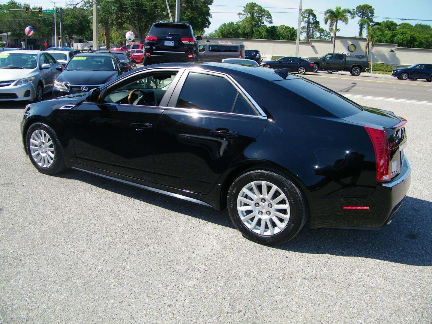 2010 Black /Black Cadillac CTS 3.0L Luxury AWD w/ Navi (1G6DH5EG7A0) with an 3.0L V6 DOHC 24V engine, 6-Speed Automatic transmission, located at 4000 Bee Ridge Road, Sarasota, FL, 34233, (941) 926-0300, 27.298664, -82.489151 - Photo#3